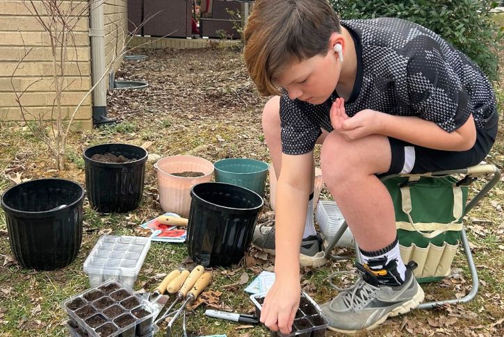 Boy planting